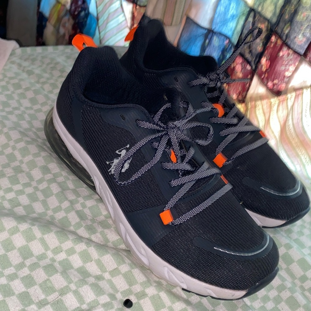 U.S. Polo Assn. shoes 
Black and orange 
Size 8 1/2 M